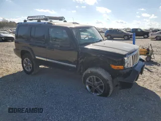 2007 Jeep Commander Overland with VIN 1J8HG68207C610814, listed as a Copart auction lot 41726555 with 211,502 mi miles and Salvage title. Bid and sale history available at DreamBid. Image 4.