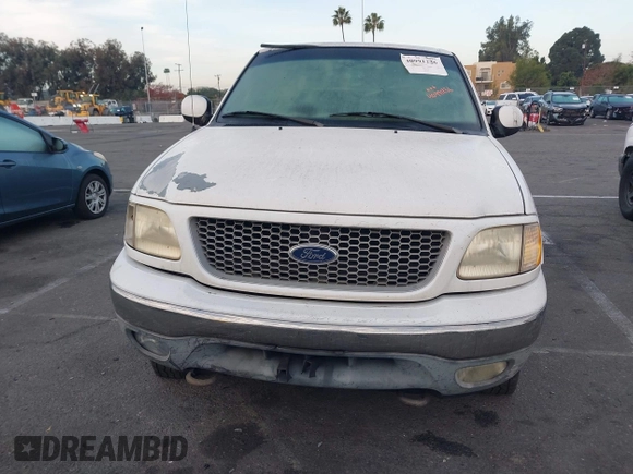 1999 Ford F-150 XL with VIN 1FTRX18L1XKB61205, listed as a IAAI auction lot 40991236 with 178,889 mi miles. Bid and sale history available at carsss.com. Image 12.