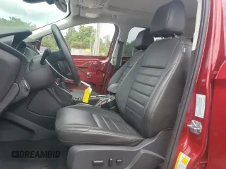 2016 Ford Escape Titanium with VIN 1FMCU9J90GUA02736, listed as a Copart auction lot 63068165 with 23,860 mi miles and Salvage title. Bid and sale history available at DreamBid. Image 7.