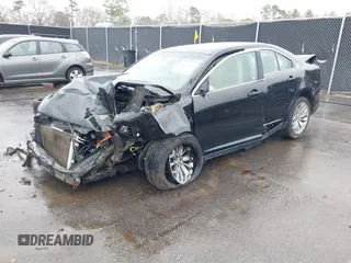 2014 Ford Taurus Limited with VIN 1FAHP2F87EG130532, listed as a IAAI auction lot 41618112 with 118,474 mi miles. Bid and sale history available at carsss.com. Image 17.