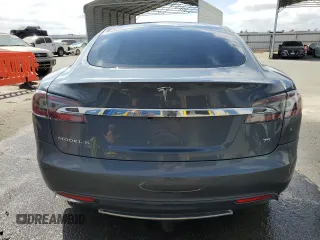 2013 Tesla Model S with VIN 5YJSA1CG9DFP09733, listed as a Copart auction lot 71574474 with 88,163 mi miles and Salvage title. Bid and sale history available at DreamBid. Image 6.