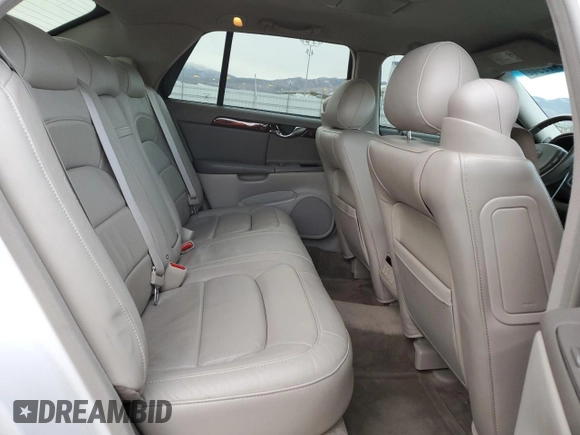 2004 Cadillac DeVille DTS z VIN 1G6KF57944U122824, wystawiony jako Copart lot #86147994 z przebiegiem 118 156 mil mil oraz Szkody całkowita. Historia ofert i sprzedaży dostępna na DreamBid. Obrazek 10.