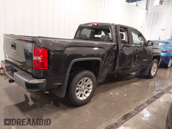 2015 GMC Sierra 1500 SLE with VIN 1GTV2UEC0FZ151760, listed as a IAAI auction lot 41988450 with 124,674 mi miles. Bid and sale history available at carsss.com. Image 4.