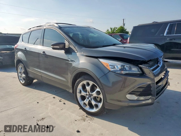 2015 Ford Escape Titanium with VIN 1FMCU0J97FUC88093, listed as a Copart auction lot 60854085 with 64,029 mi miles and Salvage title. Bid and sale history available at DreamBid. Image 4.