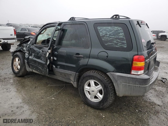 2003 Ford Escape XLS Popular with VIN 1FMYU021X3KA70123, listed as a Copart auction lot 86005514 with 0 mi miles and Salvage Title. Bid and sale history available at carsss.com. Image 2.
