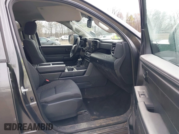 2023 Toyota Tundra with VIN 5TFKB5GDXPX002218, listed as a IAAI auction lot 41932719 with 71,335 mi miles and . Bid and sale history available at DreamBid. Image 5.