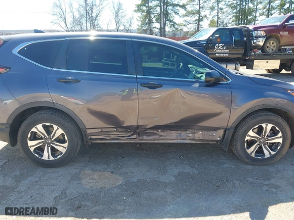 2020 Honda CR-V LX with VIN 5J6RW1H26LL009543, listed as a IAAI auction lot 41753861 with 65,440 mi miles. Bid and sale history available at carsss.com. Image 6.