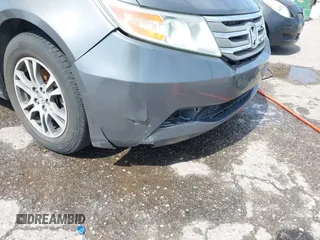 2011 Honda Odyssey EX-L with VIN 5FNRL5H68BB086943, listed as a IAAI auction lot 42503744 with 225,376 mi miles and . Bid and sale history available at DreamBid. Image 6.