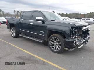 2018 Chevrolet Silverado 1500 High Country with VIN 3GCUKTEJ6JG178894, listed as a IAAI auction lot 41606265 with 148,068 mi miles and . Bid and sale history available at DreamBid. Image 1.