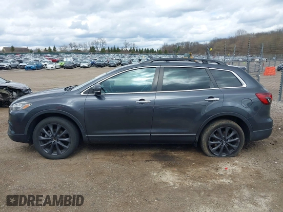 2015 Mazda CX-9 Grand Touring with VIN JM3TB3DV1F0465966, listed as a IAAI auction lot 42049749 with 74,470 mi miles and . Bid and sale history available at DreamBid. Image 14.