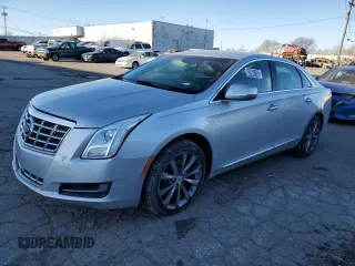 2014 Cadillac XTS with VIN 2G61L5S3XE9169958, listed as a Copart auction lot 42042145 with 100,359 mi miles and Clean Title. Bid and sale history available at carsss.com. Image 1.