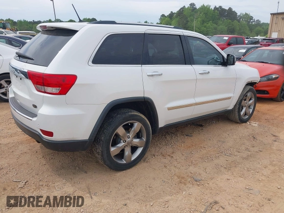2013 Jeep Grand Cherokee Overland with VIN 1C4RJECGXDC621227, listed as a IAAI auction lot 42098042 with 194,232 mi miles and . Bid and sale history available at DreamBid. Image 4.