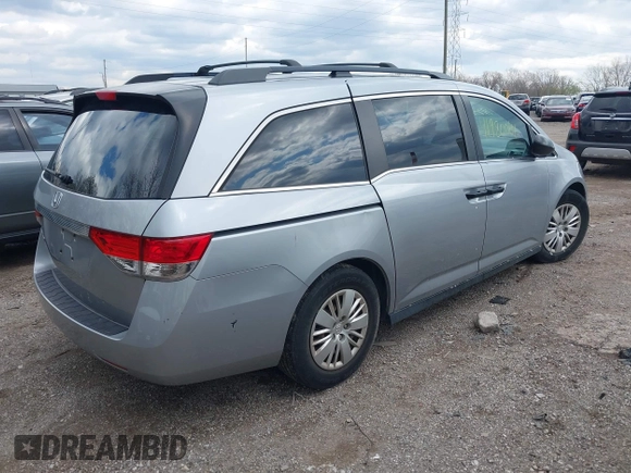 2016 Honda Odyssey LX with VIN 5FNRL5H23GB028338, listed as a IAAI auction lot 41980064 with 186,403 mi miles and . Bid and sale history available at DreamBid. Image 4.