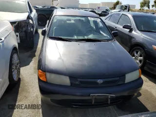 1997 Mazda Protege DX z VIN JM1BC1412V0157268, wystawiony jako Copart lot #61380564 z przebiegiem 85 356 mil mil oraz Szkoda całkowita • Salvage title. Historia ofert i sprzedaży dostępna na DreamBid. Obrazek 5.