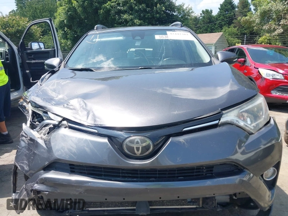 2018 Toyota RAV4 XLE with VIN JTMWFREV9JJ201845, listed as a IAAI auction lot 42442303 with 111,177 mi miles and . Bid and sale history available at DreamBid. Image 12.
