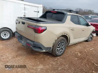 2023 Hyundai Santa Cruz SEL Premium z VIN 5NTJDDAF7PH046605, wystawiony jako IAAI lot #41488316 z przebiegiem 68 562 mil mil oraz . Historia ofert i sprzedaży dostępna na DreamBid. Obrazek 4.