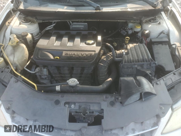 2008 Chrysler Sebring LX z VIN 1C3LC46K48N167789, wystawiony jako Copart lot #57791965 z przebiegiem 152 080 mil mil oraz Szkoda całkowita • Salvage title. Historia ofert i sprzedaży dostępna na DreamBid. Obrazek 11.