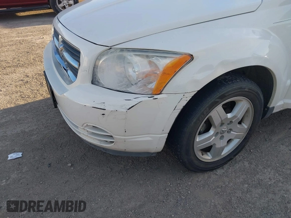 2008 Dodge Caliber SXT with VIN 1B3HB48B38D668777, listed as a IAAI auction lot 41202480 with 156,790 mi miles and . Bid and sale history available at DreamBid. Image 6.