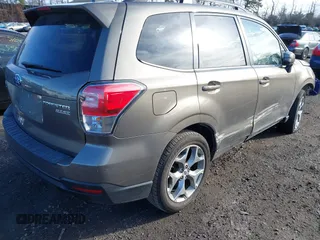 2017 Subaru Forester Touring z VIN JF2SJAWC9HH507636, wystawiony jako IAAI lot #41801988 z przebiegiem 32 030 mil mil oraz . Historia ofert i sprzedaży dostępna na DreamBid. Obrazek 4.