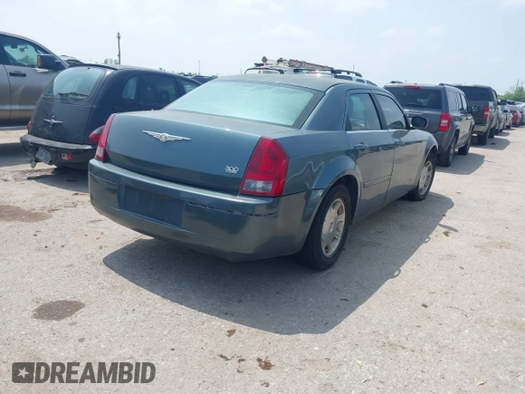 2006 Chrysler 300 Touring with VIN 2C3KA53G16H151319, listed as a IAAI auction lot 41917412 with 245,741 mi miles. Bid and sale history available at carsss.com. Image 4.