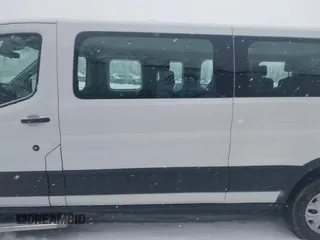 2019 Ford Transit Passenger XL z VIN 1FBZX2ZM4KKB53934, wystawiony jako IAAI lot #41260226 z przebiegiem 153 409 mil mil oraz . Historia ofert i sprzedaży dostępna na DreamBid. Obrazek 15.