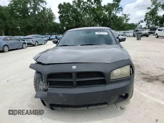 2009 Dodge Charger SE z VIN 2B3KA43DX9H530580, wystawiony jako Copart lot #58381375 z przebiegiem 300 292 mil mil oraz Szkoda całkowita • Salvage title. Historia ofert i sprzedaży dostępna na DreamBid. Obrazek 13.