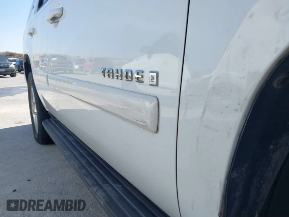 2007 Chevrolet Tahoe LTZ with VIN 1GNFC13027J402178, listed as a IAAI auction lot 41605898 with 203,677 mi miles and . Bid and sale history available at DreamBid. Image 12.