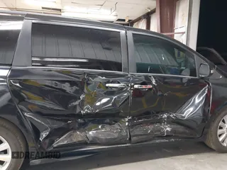 2016 Toyota Sienna XLE with VIN 5TDYK3DC2GS757749, listed as a IAAI auction lot 42617318 with 139,737 mi miles and . Bid and sale history available at DreamBid. Image 6.