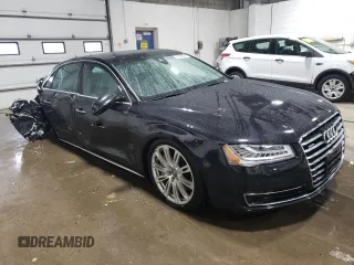 2015 Audi A8 4.0T z VIN WAU32AFD0FN017865, wystawiony jako Copart lot #37065594 z przebiegiem 55 632 mil mil oraz Szkoda całkowita • Salvage title. Historia ofert i sprzedaży dostępna na DreamBid. Obrazek 4.