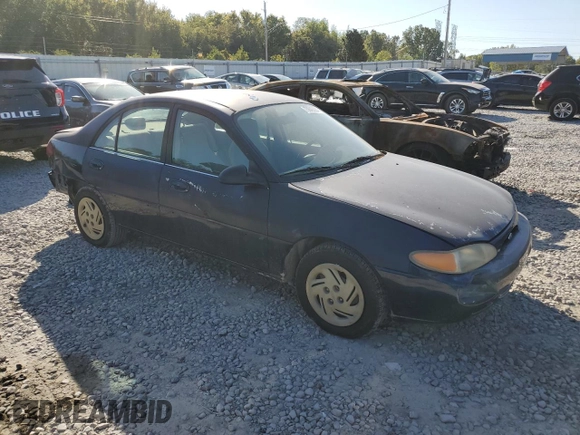 2001 Ford Escort Fleet with VIN 3FAFP13PX1R120920, listed as a Copart auction lot 75643024 with 128,089 mi miles and Salvage title. Bid and sale history available at DreamBid. Image 4.