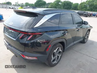 2022 Hyundai Tucson SEL with VIN 5NMJC3AE1NH012981, listed as a IAAI auction lot 41957812 with 38,284 mi miles and . Bid and sale history available at DreamBid. Image 4.