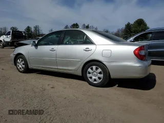 2002 Toyota Camry LE z VIN 4T1BE32K02U084676, wystawiony jako Copart lot #49712395 z przebiegiem 74 049 mil mil oraz Czysty tytuł • Clean title. Historia ofert i sprzedaży dostępna na DreamBid. Obrazek 2.