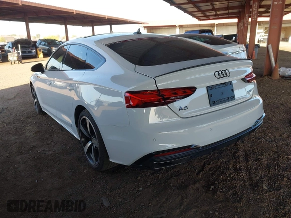 2023 Audi A5 Sportback S line Premium Plus z VIN WAUFACF50PA037465, wystawiony jako IAAI lot #42115428 z przebiegiem 34 463 mil mil oraz . Historia ofert i sprzedaży dostępna na DreamBid. Obrazek 3.