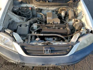 1999 Honda CR-V LX with VIN JHLRD1848XC027046, listed as a Copart auction lot 64091164 with 144,844 mi miles and Salvage Title. Bid and sale history available at carsss.com. Image 12.