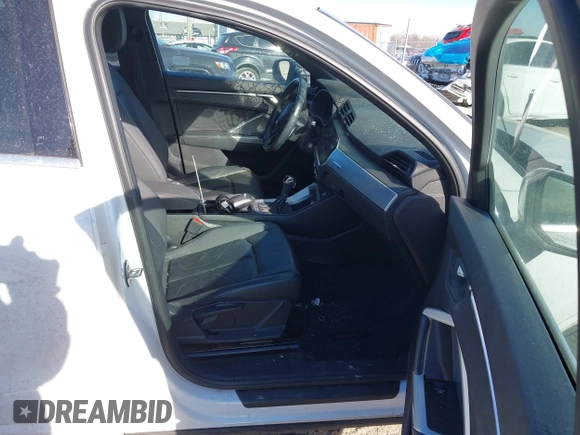 2019 Audi Q3 Premium with VIN WA1AECF34K1078362, listed as a IAAI auction lot 41274771 with 99,867 mi miles and . Bid and sale history available at DreamBid. Image 5.