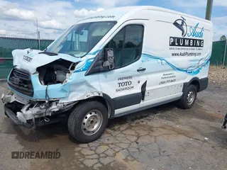 2016 Ford Transit Cargo z VIN 1FTYE1CM1GKA29370, wystawiony jako IAAI lot #42177908 z przebiegiem 155 718 mil mil oraz . Historia ofert i sprzedaży dostępna na DreamBid. Obrazek 2.