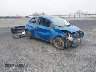 2011 Toyota Yaris with VIN JTDJT4K38B5329013, listed as a IAAI auction lot 41492239 with 200,180 mi miles. Bid and sale history available at carsss.com. Image 1.