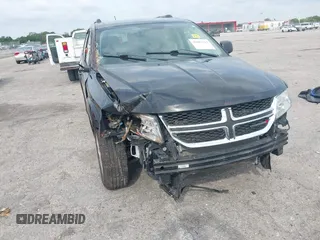 2017 Dodge Journey SE with VIN 3C4PDCAB4HT691343, listed as a IAAI auction lot 41863725 with 99,519 mi miles and . Bid and sale history available at carsss.com. Image 6.