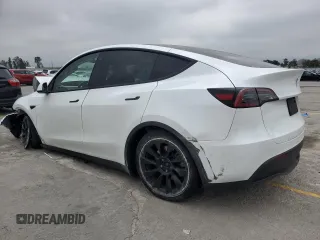 2023 Tesla Model Y Long Range z VIN 7SAYGDEE9PA070232, wystawiony jako Copart lot #55881805 z przebiegiem 38 276 mil mil oraz Szkoda całkowita • Salvage title. Historia ofert i sprzedaży dostępna na DreamBid. Obrazek 2.