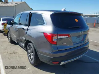 2020 Honda Pilot EX-L with VIN 5FNYF5H51LB020830, listed as a IAAI auction lot 42255746 with 60,503 mi miles and . Bid and sale history available at DreamBid. Image 3.