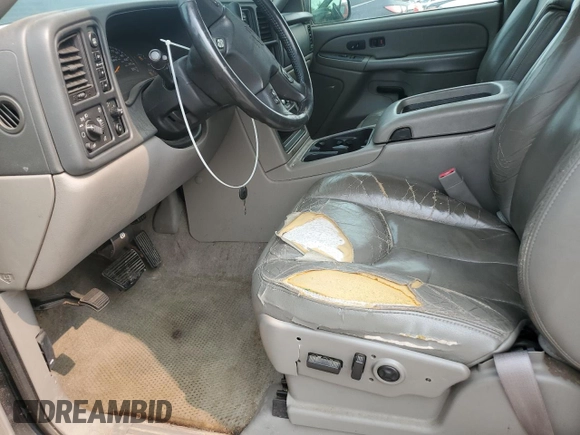 2004 Chevrolet Tahoe Z71 z VIN 1GNEK13ZX4R159262, wystawiony jako Copart lot #58047455 z przebiegiem Nie podano mil oraz Szkoda całkowita • Salvage title. Historia ofert i sprzedaży dostępna na DreamBid. Obrazek 7.