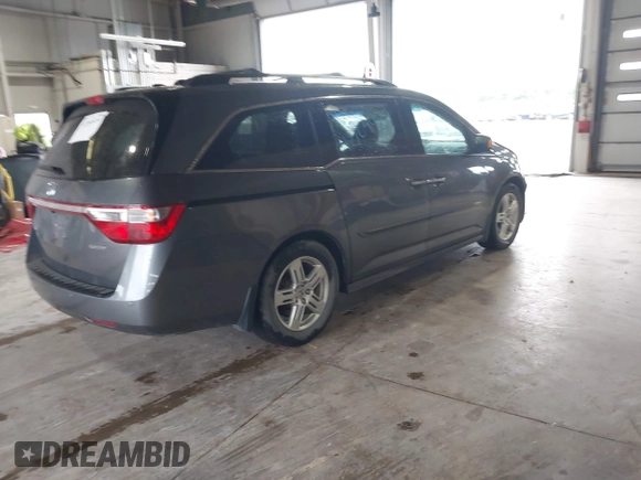 2011 Honda Odyssey Touring с VIN 5FNRL5H90BB025855, выставлен на аукционе IAAI как лот 42104979 с пробегом 165 010 миль миль и . История ставок и продаж доступна на DreamBid. Изображение 4.