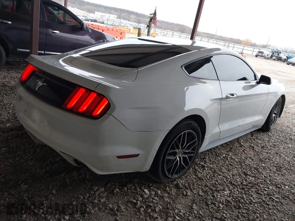 2016 Ford Mustang V6 with VIN 1FA6P8AM9G5310477, listed as a IAAI auction lot 41119189 with 130,786 mi miles and . Bid and sale history available at carsss.com. Image 4.
