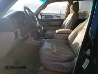 1999 Toyota Land Cruiser with VIN JT3HT05J5X0072564, listed as a Copart auction lot 77000044 with 312,428 mi miles and Salvage Title. Bid and sale history available at carsss.com. Image 7.