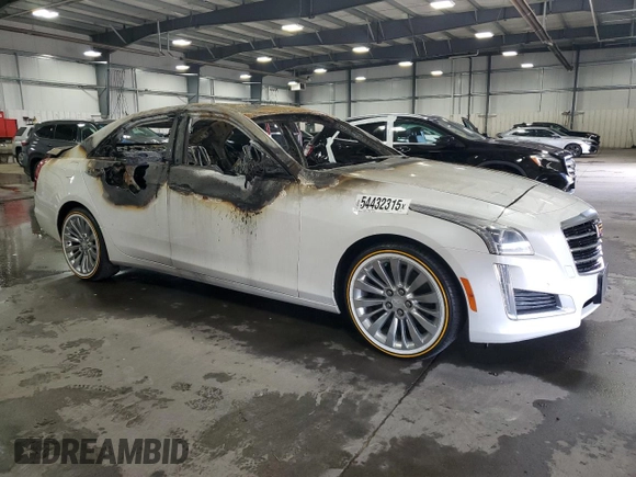 2015 Cadillac CTS Luxury AWD with VIN 1G6AX5SX2F0143051, listed as a Copart auction lot 54432315 with Not provided miles and Salvage title. Bid and sale history available at DreamBid. Image 4.