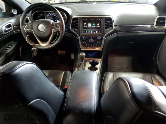 2016 Jeep Grand Cherokee Overland with VIN 1C4RJFCG9GC345309, listed as a Copart auction lot 61095285 with 115,968 mi miles and Salvage title. Bid and sale history available at DreamBid. Image 8.