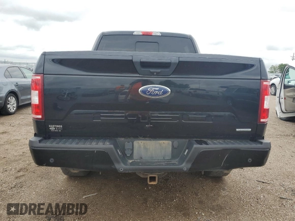 2018 Ford F-150 XL with VIN 1FTEW1EPXJFB04008, listed as a Copart auction lot 61062825 with 94,030 mi miles and Salvage title. Bid and sale history available at DreamBid. Image 6.