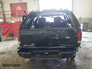 2001 Chevrolet Blazer LS with VIN 1GNCS18W51K260297, listed as a IAAI auction lot 41697909 with 144,564 mi miles. Bid and sale history available at carsss.com. Image 6.