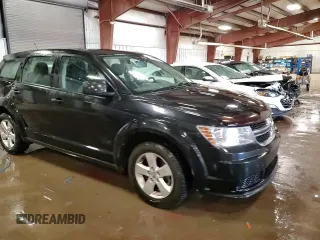 2013 Dodge Journey American Value with VIN 3C4PDCABXDT502334, listed as a Copart auction lot 58428235 with 162,009 mi miles and Clean title. Bid and sale history available at DreamBid. Image 14.