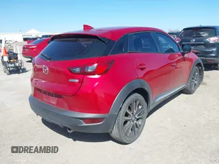 2016 Mazda CX-3 Grand Touring with VIN JM1DKBD71G0112329, listed as a IAAI auction lot 41662610 with 145,329 mi miles. Bid and sale history available at carsss.com. Image 4.